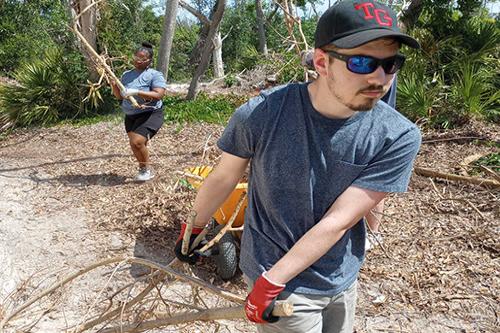 Students aid in hurricane cleanup